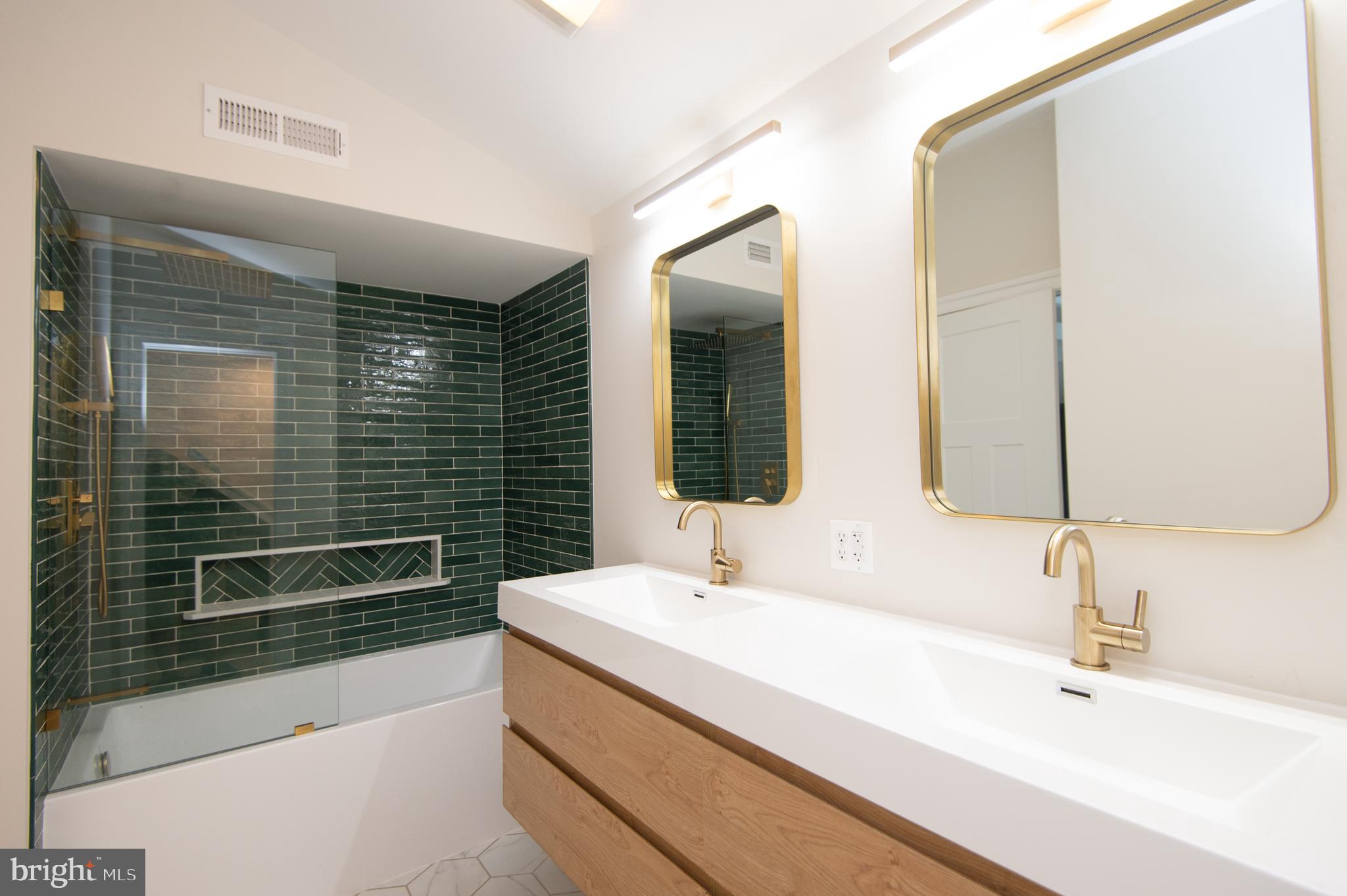 110 Second Street Secretary, MD 21664 - Photo 22 of 36 a bathroom with a sink and a mirror