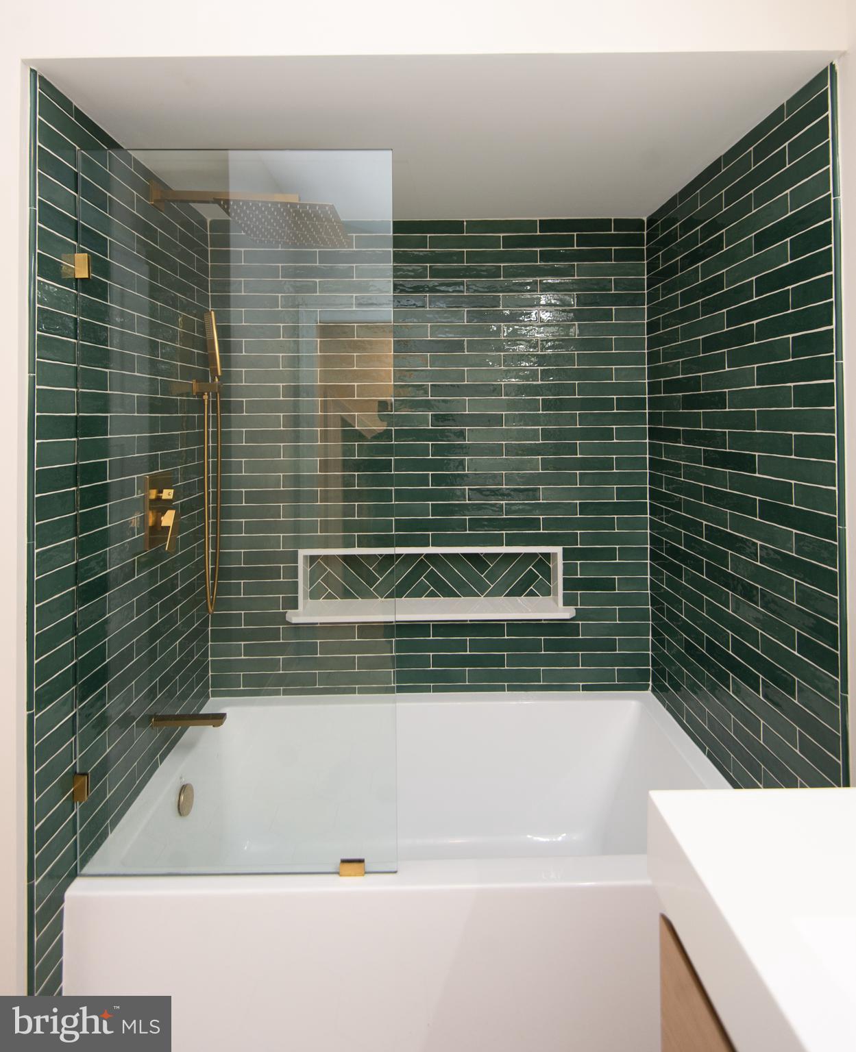 110 Second Street Secretary, MD 21664 - Photo 23 of 36 a bathroom with a bathtub and a shower