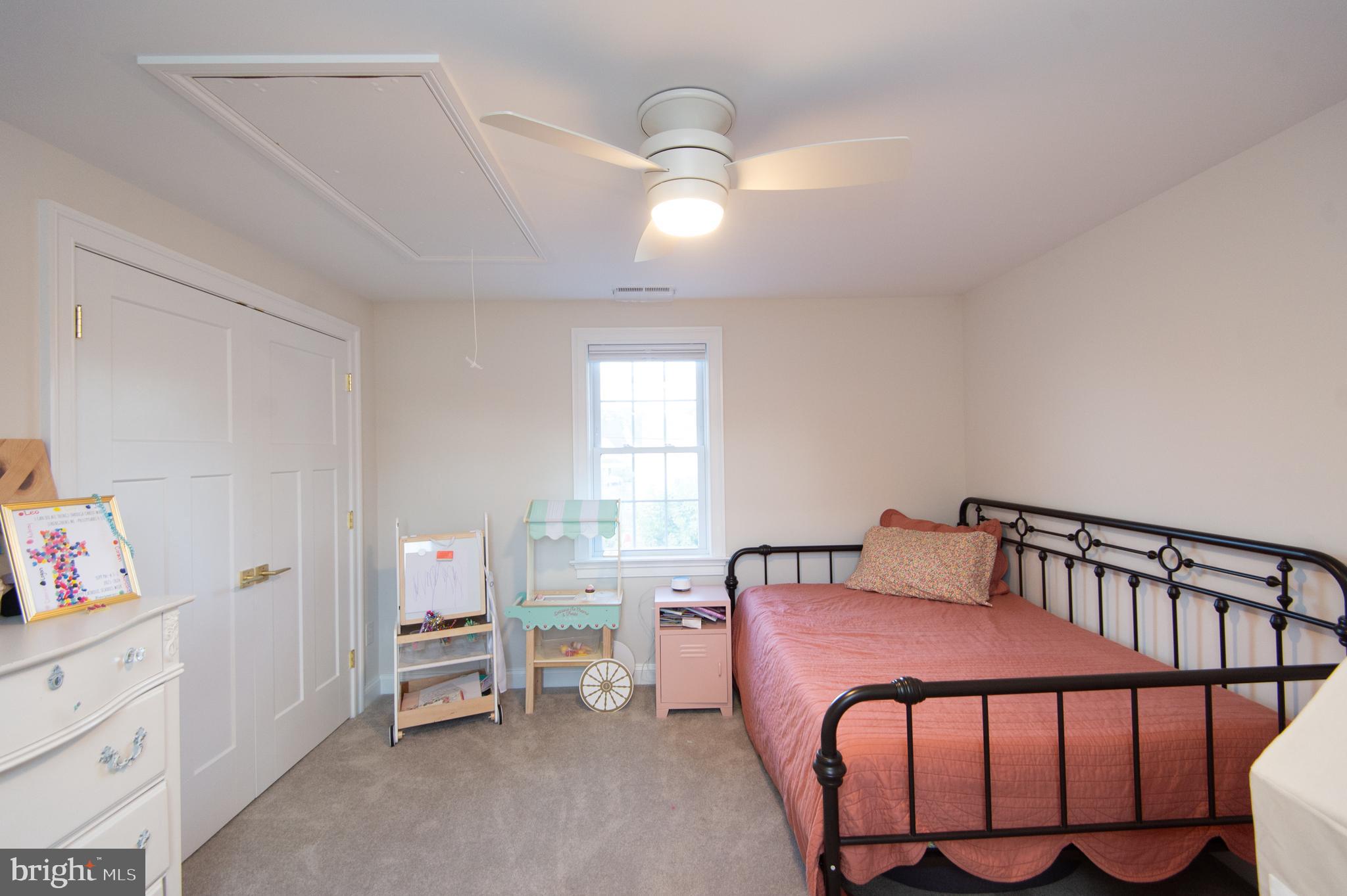 110 Second Street Secretary, MD 21664 - Photo 24 of 36 a bedroom with a bed and a window