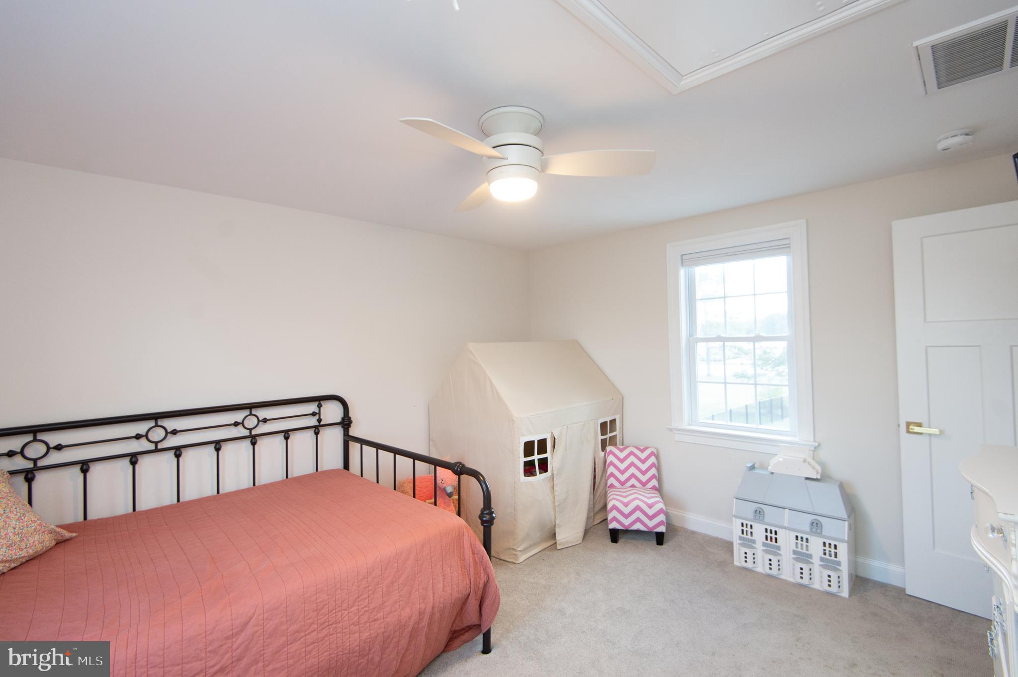 110 Second Street Secretary, MD 21664 - Photo 25 of 36 a bedroom with a bed and window