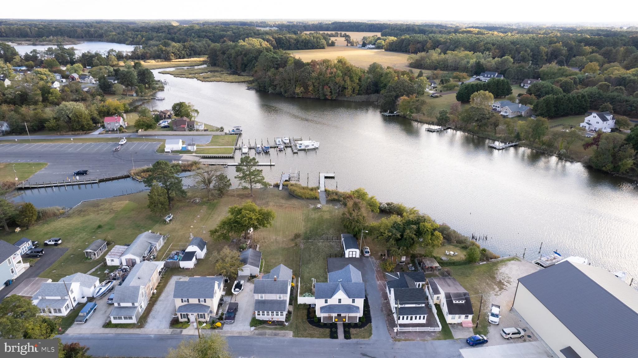 110 Second Street Secretary, MD 21664 - Photo 30 of 36 an aerial view of lake residential house with swimming pool