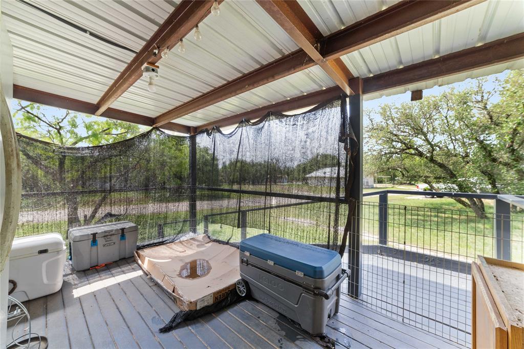 4991 Thunderbird Drive May, TX 76857 - Photo 33 of 34 Wooden deck with area for grilling