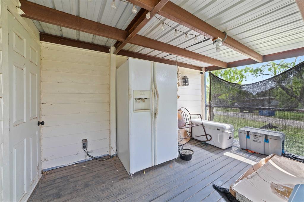 4991 Thunderbird Drive May, TX 76857 - Photo 34 of 34 Wooden terrace featuring fence