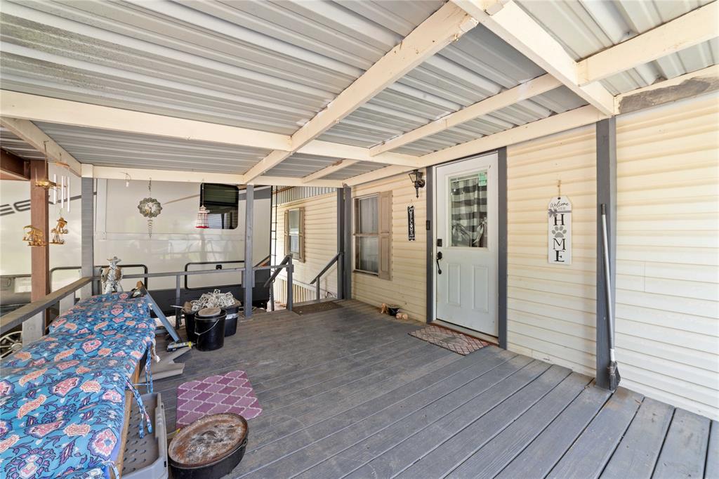 4991 Thunderbird Drive May, TX 76857 - Photo 4 of 34 View of wooden deck