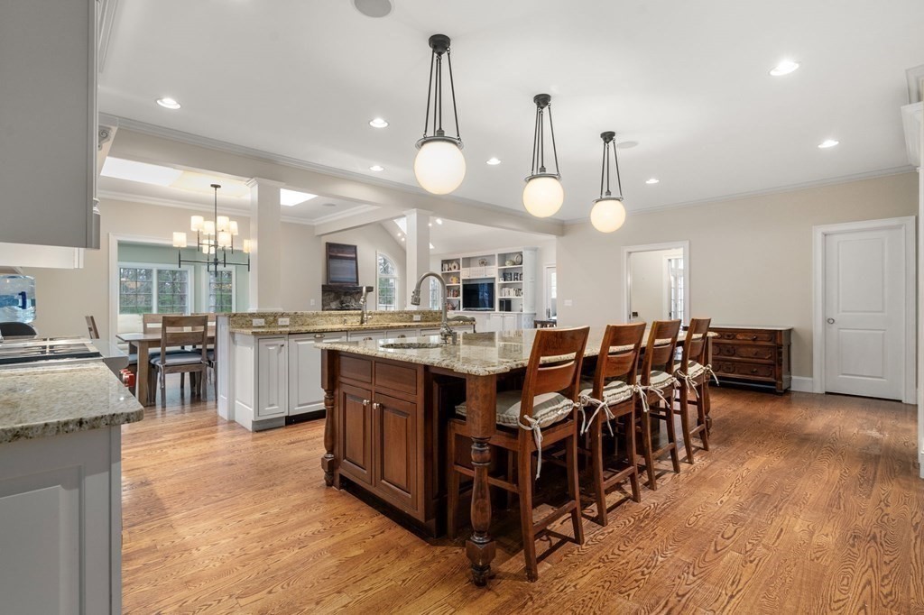 7 Donnelly Drive Dover, MA 02030 - Photo 11 of 29 a large kitchen with lots of wooden furniture