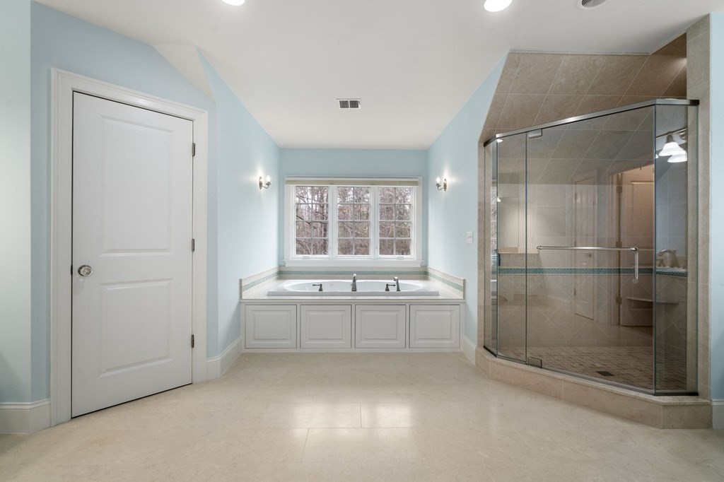 7 Donnelly Drive Dover, MA 02030 - Photo 19 of 29 a bathroom with a tub shower and sink