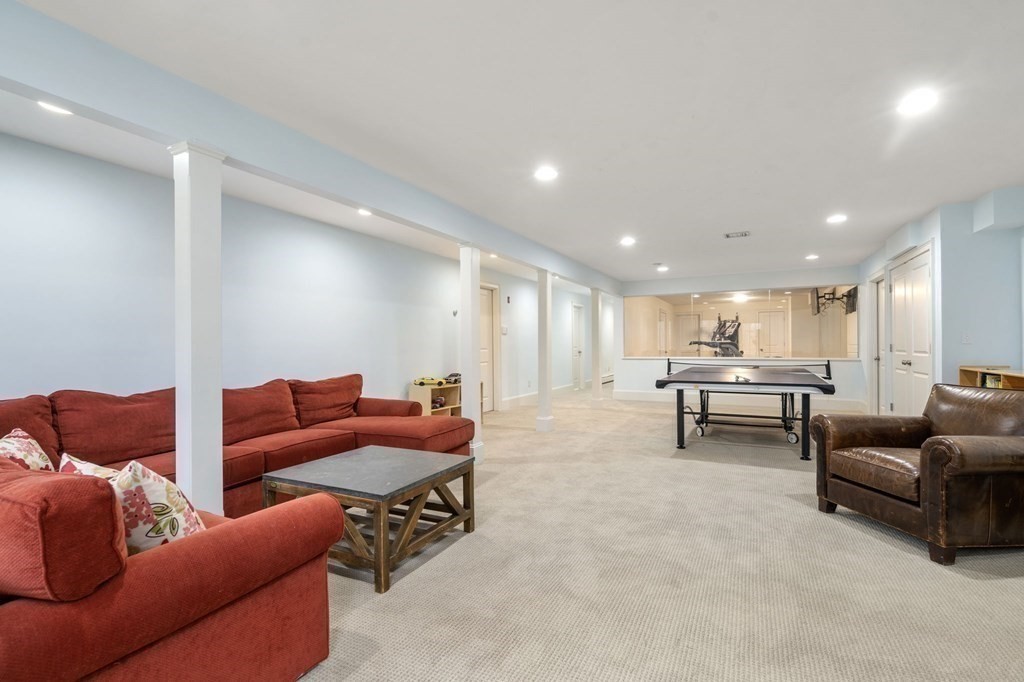 7 Donnelly Drive Dover, MA 02030 - Photo 23 of 29 a living room with furniture and a couch