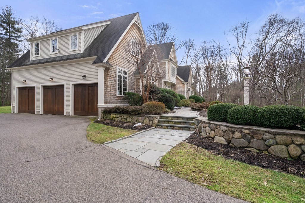 7 Donnelly Drive Dover, MA 02030 - Photo 29 of 29 a front view of a house with garden