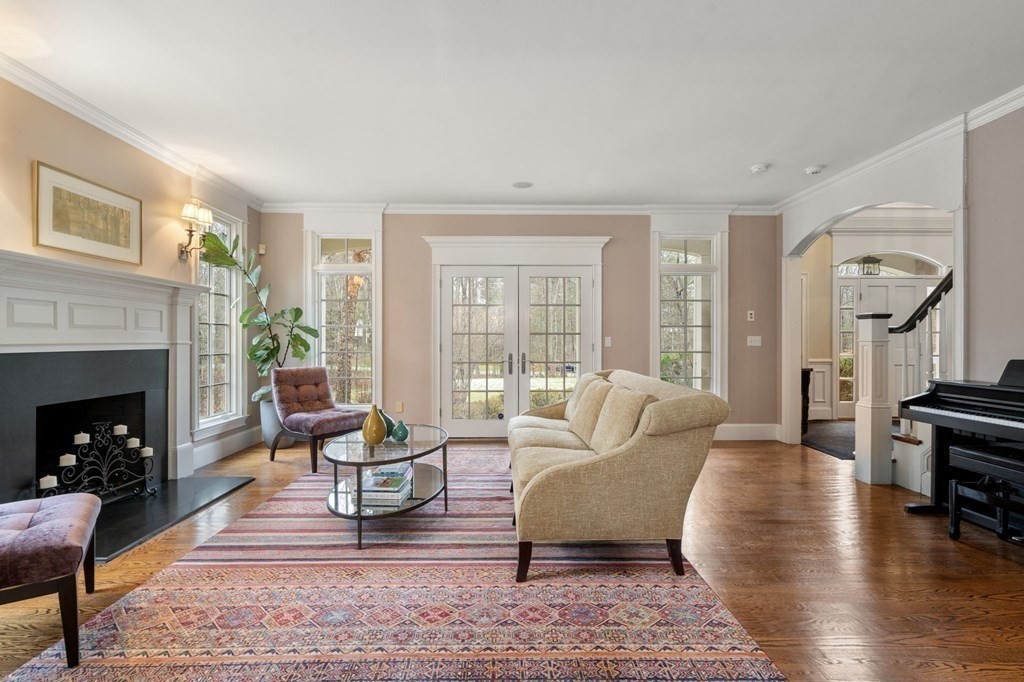 7 Donnelly Drive Dover, MA 02030 - Photo 3 of 29 a living room with furniture and a fireplace