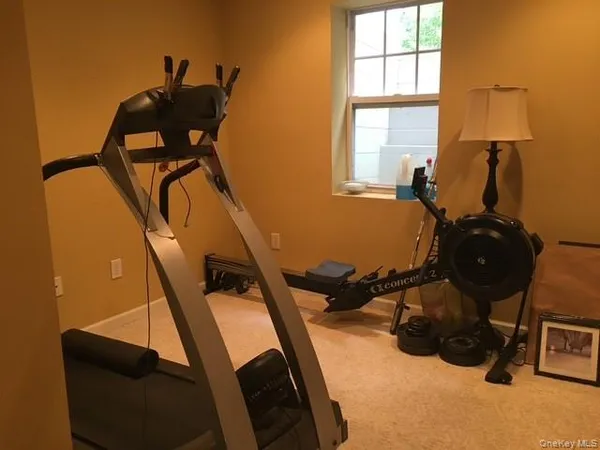 a room with furniture and a window