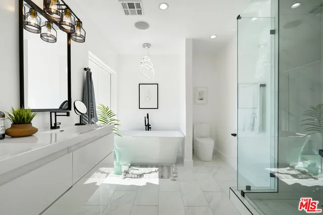 a view of a swimming pool with a lounge chair