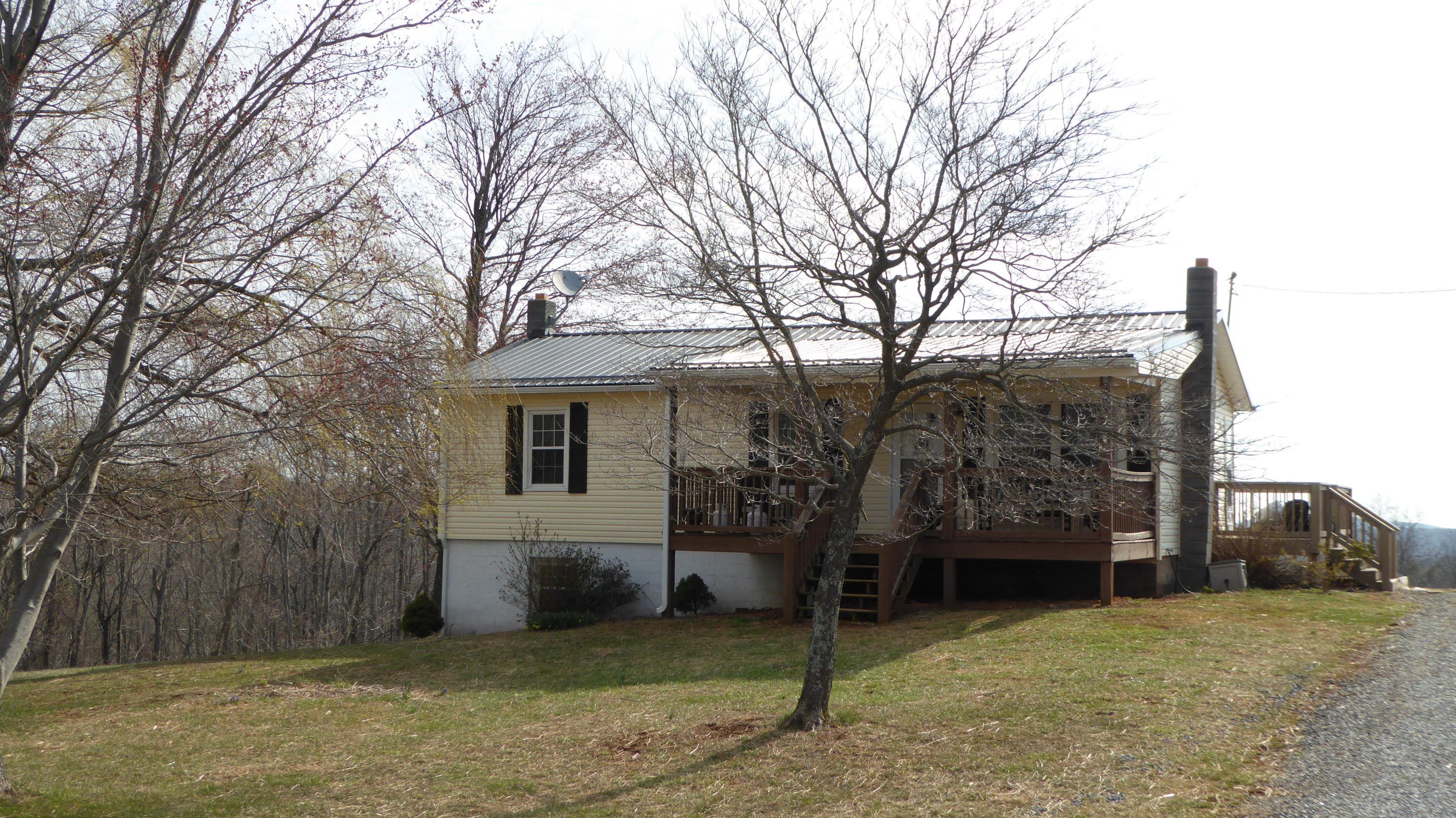 280 Rock Ridge Road Callaway, VA 24067 - Photo 20 of 37 a view of a house with a yard and garage