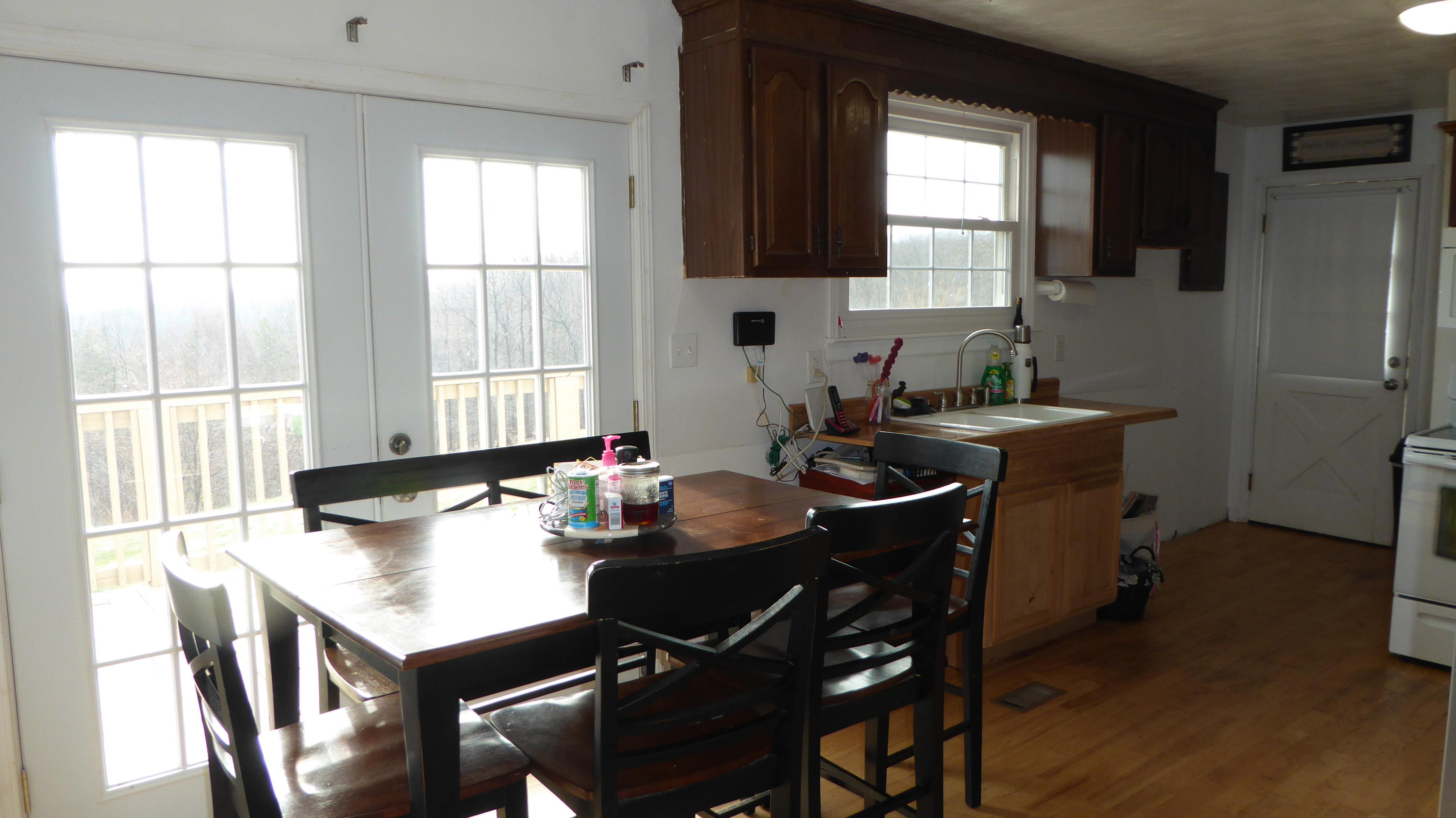 280 Rock Ridge Road Callaway, VA 24067 - Photo 23 of 37 a kitchen with a table chairs and a window