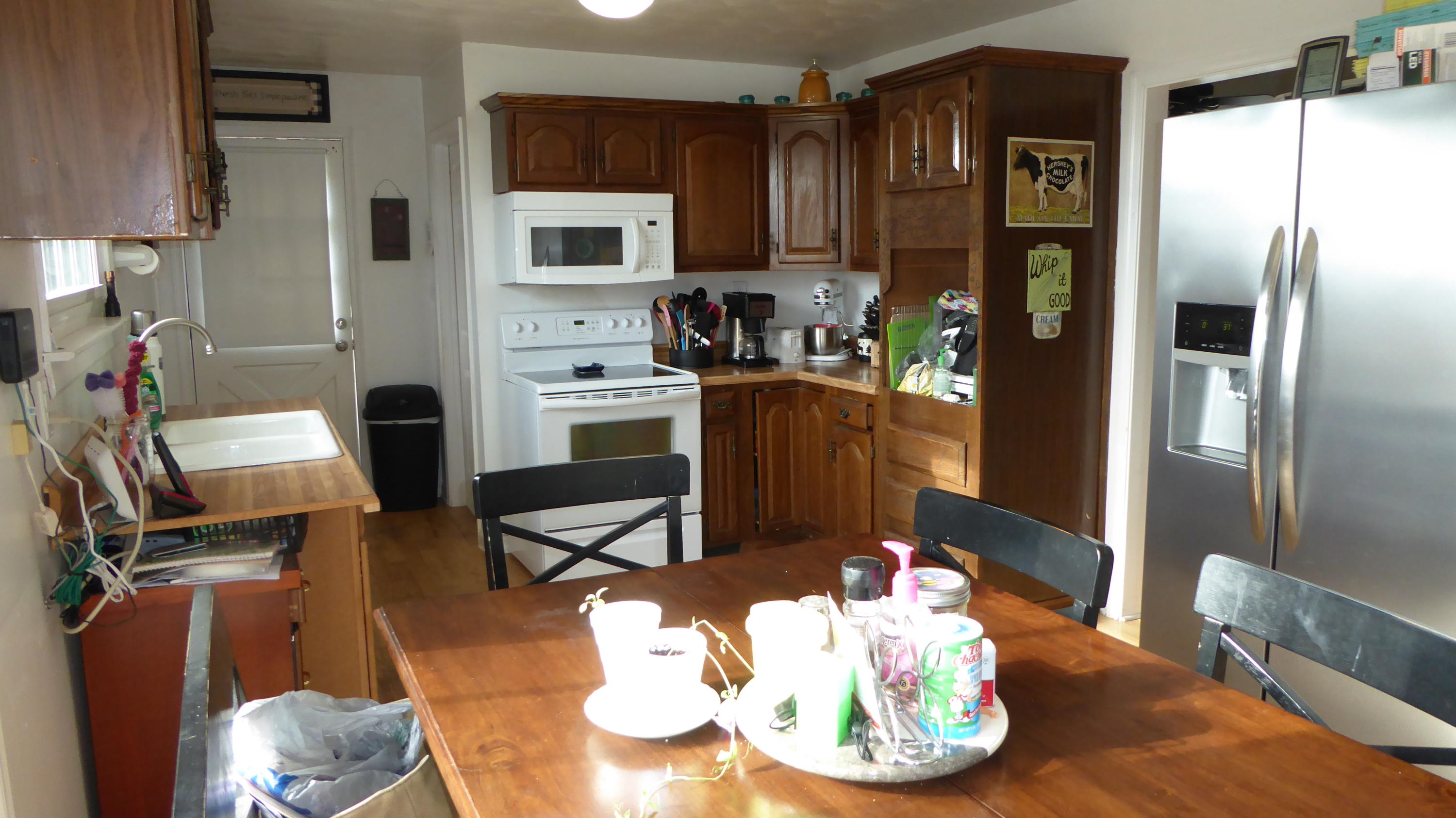 280 Rock Ridge Road Callaway, VA 24067 - Photo 5 of 37 a kitchen with stainless steel appliances granite countertop a refrigerator a stove and a sink