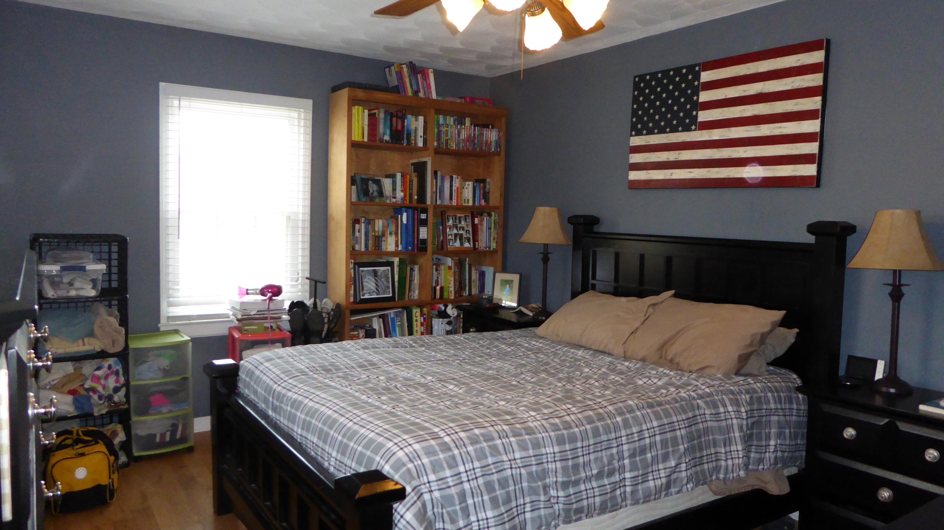 280 Rock Ridge Road Callaway, VA 24067 - Photo 6 of 37 a bedroom with a bed and a chandelier