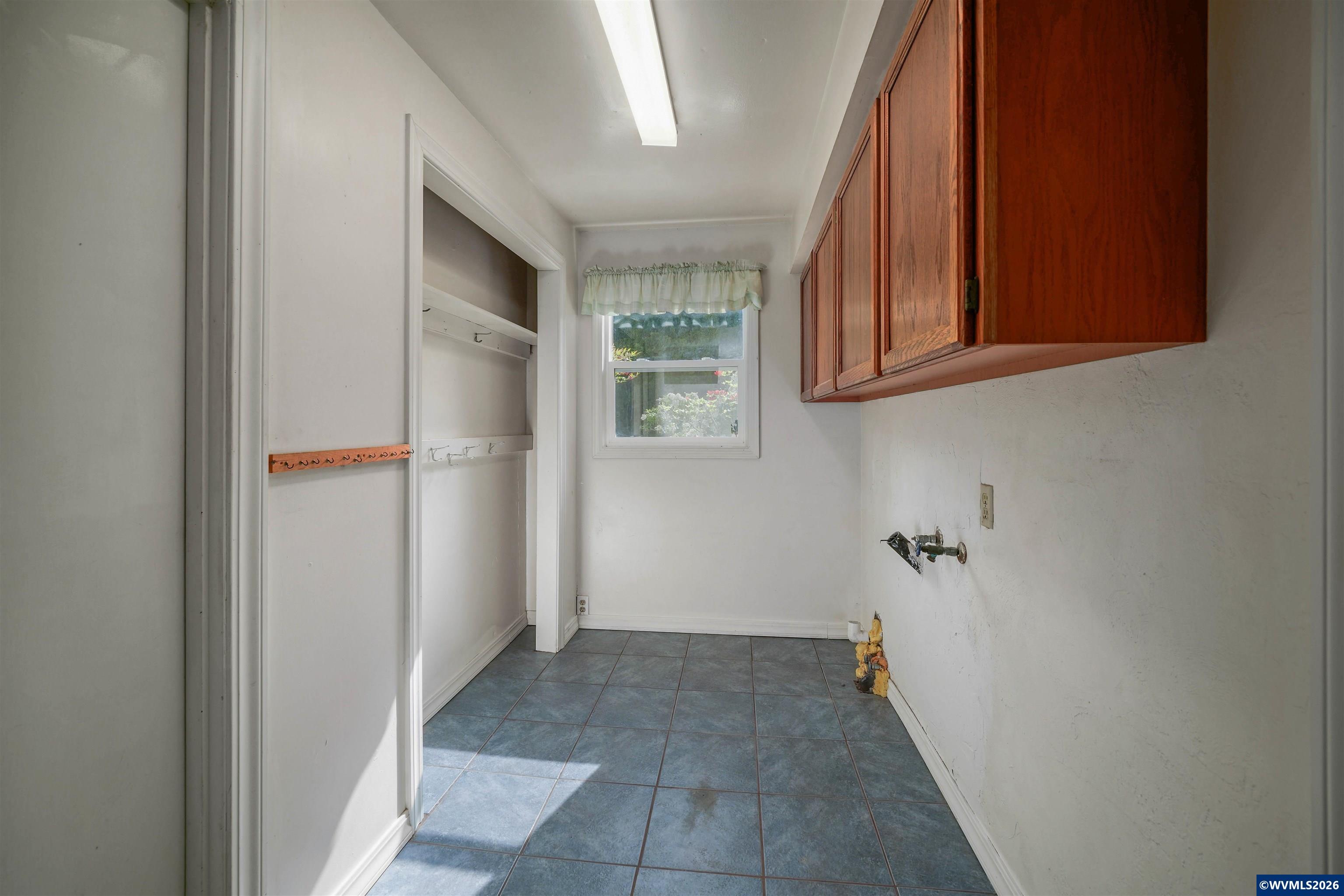 220 Northwest Downy Drive Sublimity, OR 97385 - Photo 19 of 47 a view of an empty room with a window