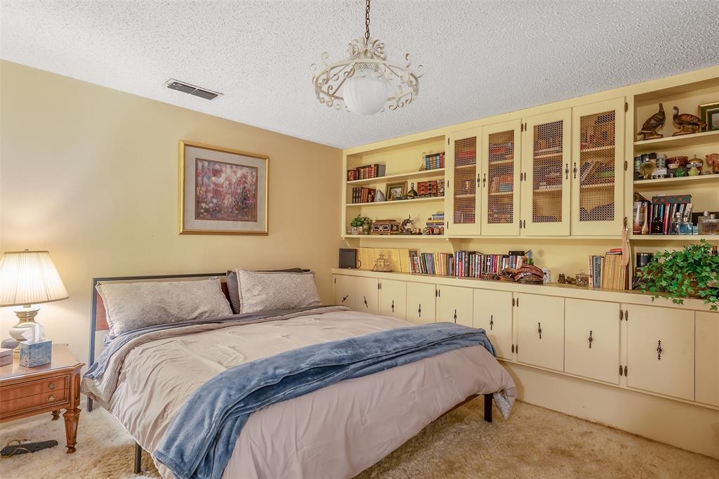 100 Inwood Street Mineola, TX 75773 - Photo 24 of 31 a bedroom with bed and window