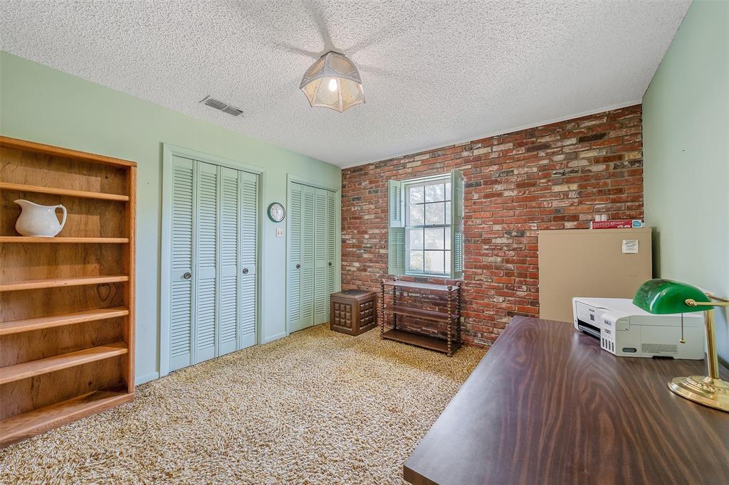 100 Inwood Street Mineola, TX 75773 - Photo 25 of 31 wooden floor in an empty room with a window
