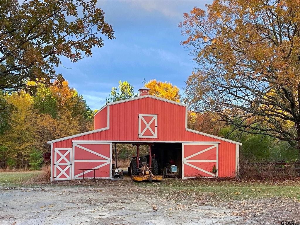 100 Inwood Street Mineola, TX 75773 - Photo 28 of 31 a front view of a house with garden