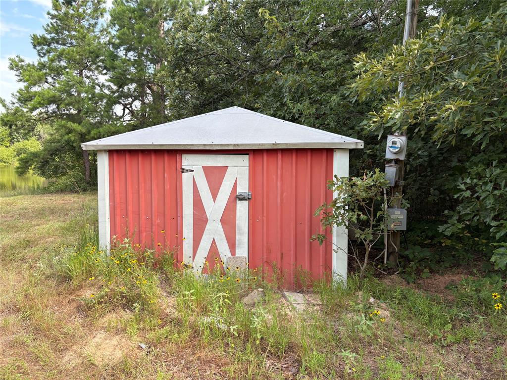 100 Inwood Street Mineola, TX 75773 - Photo 31 of 31 a view of a house with a yard
