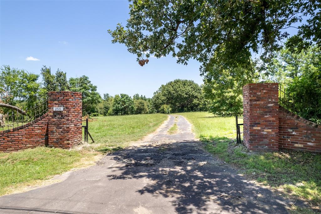100 Inwood Street Mineola, TX 75773 - Photo 10 of 31 a view of a house with a yard