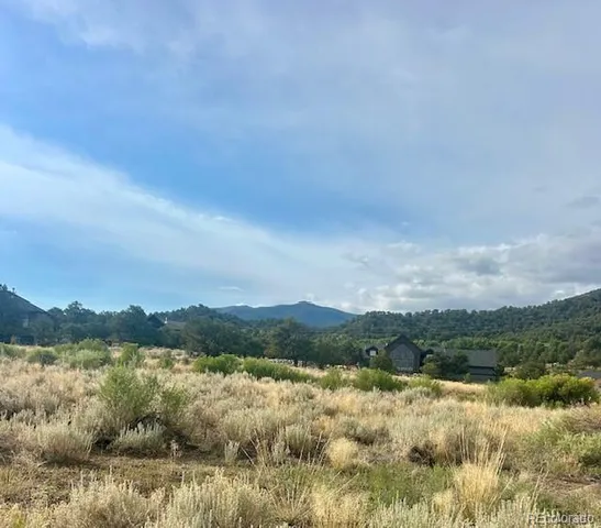 a view of ocean and mountain