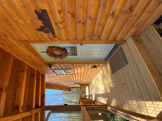 a view of entryway with a front door