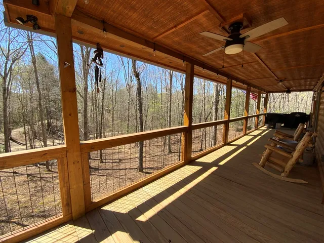 a view of balcony with wooden floor