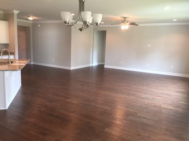 590 Las Roblas Grande Drive Santa Rosa Beach, FL 32459 - Photo 13 of 20 a view of a room with wooden floor