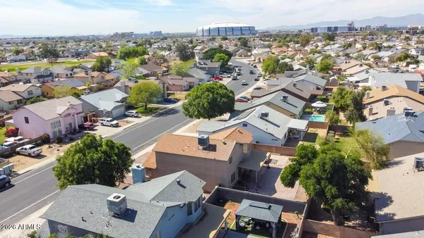 an aerial view of a city with lots of residential buildings