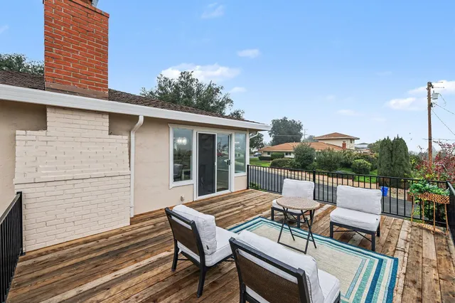 a view of a patio on the roof deck