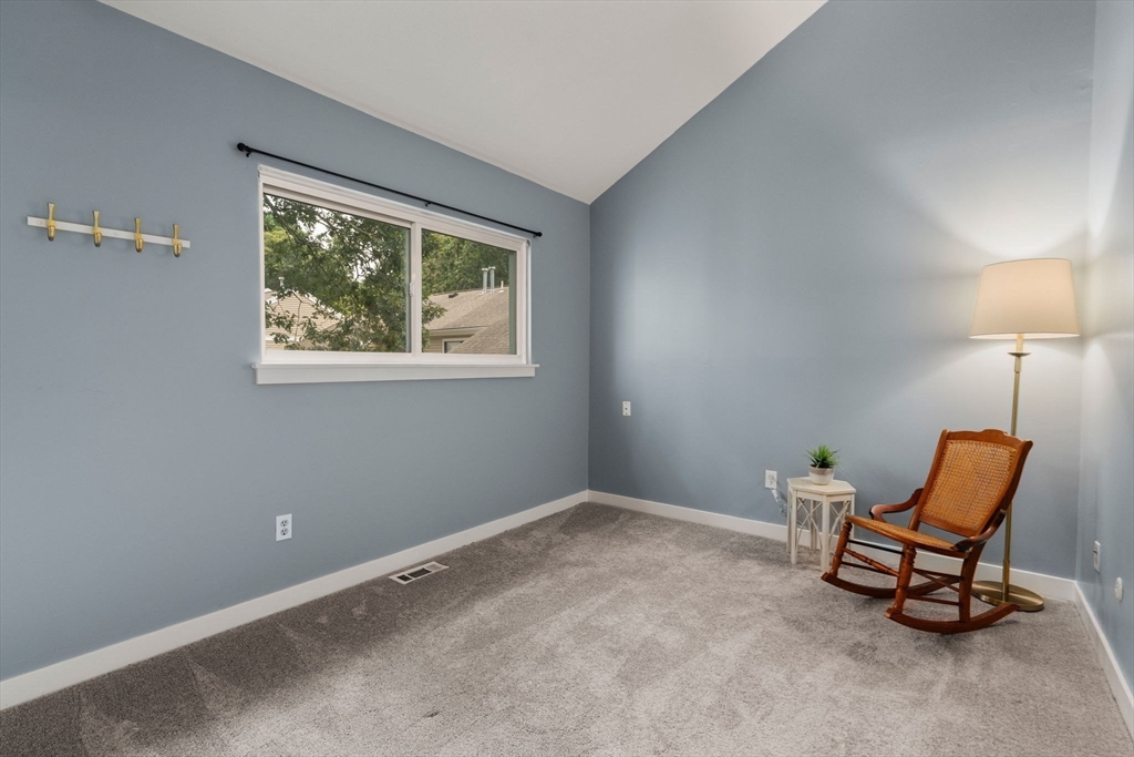 509 Dongary Road, Unit 509 Easton, MA 02375 - Photo 20 of 29 a room with a window and a lamp