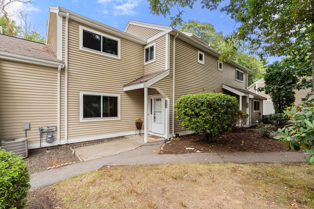 509 Dongary Road, Unit 509 Easton, MA 02375 - Photo 24 of 29 a view of a house with a yard