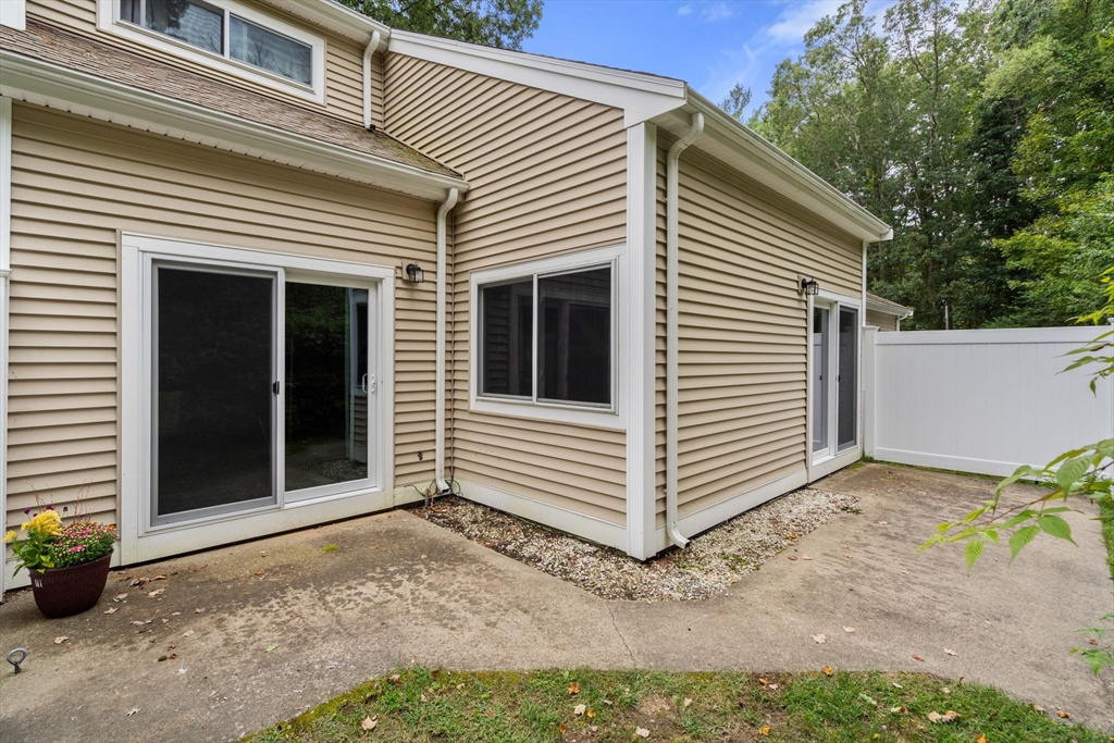 509 Dongary Road, Unit 509 Easton, MA 02375 - Photo 25 of 29 a view of a house with a yard