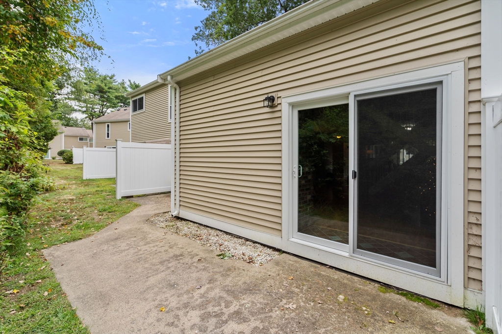 509 Dongary Road, Unit 509 Easton, MA 02375 - Photo 28 of 29 a view of a back yard of the house