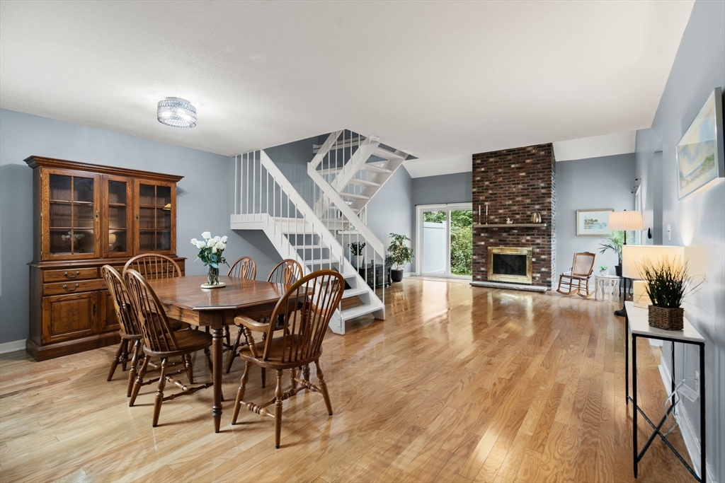 509 Dongary Road, Unit 509 Easton, MA 02375 - Photo 4 of 29 a dining room with furniture and wooden floor