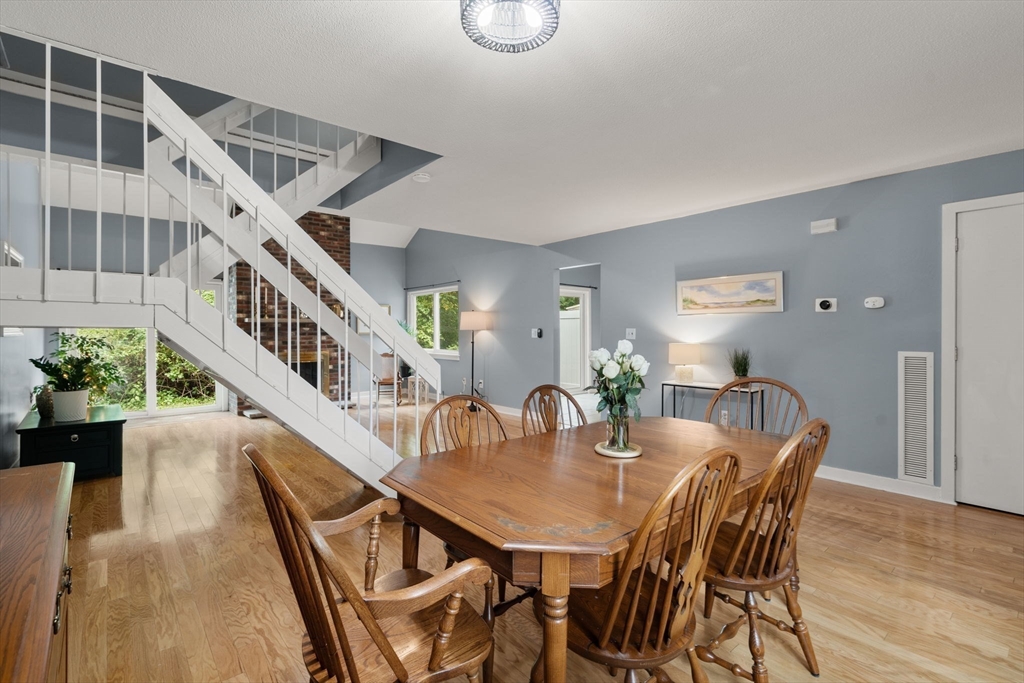 509 Dongary Road, Unit 509 Easton, MA 02375 - Photo 5 of 29 a dining room with furniture and wooden floor