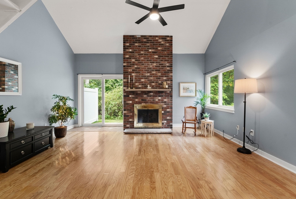 509 Dongary Road, Unit 509 Easton, MA 02375 - Photo 7 of 29 a living room with furniture and a fireplace