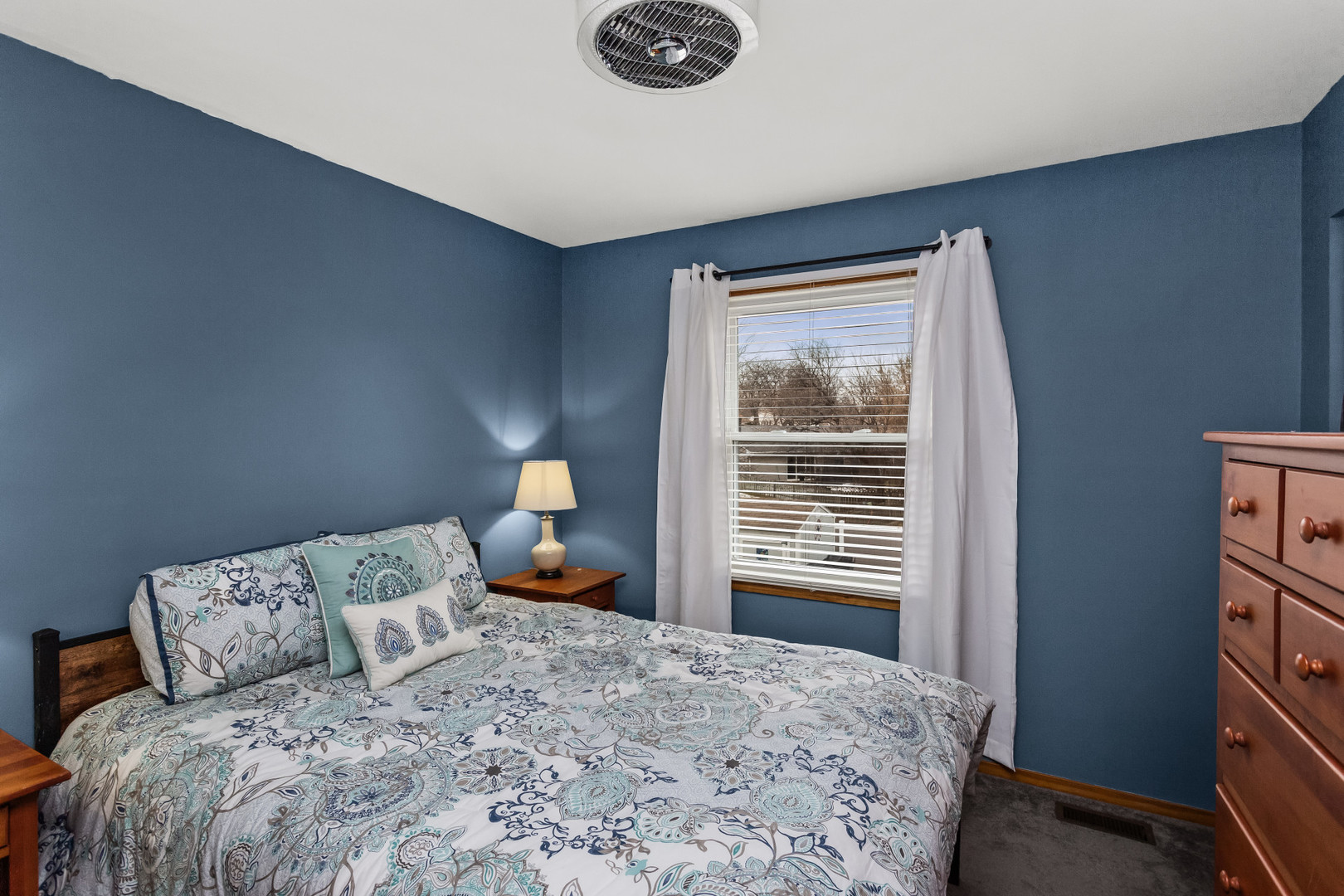 960 Mensching Road Roselle, IL 60172 - Photo 17 of 25 a bedroom with a bed and a window