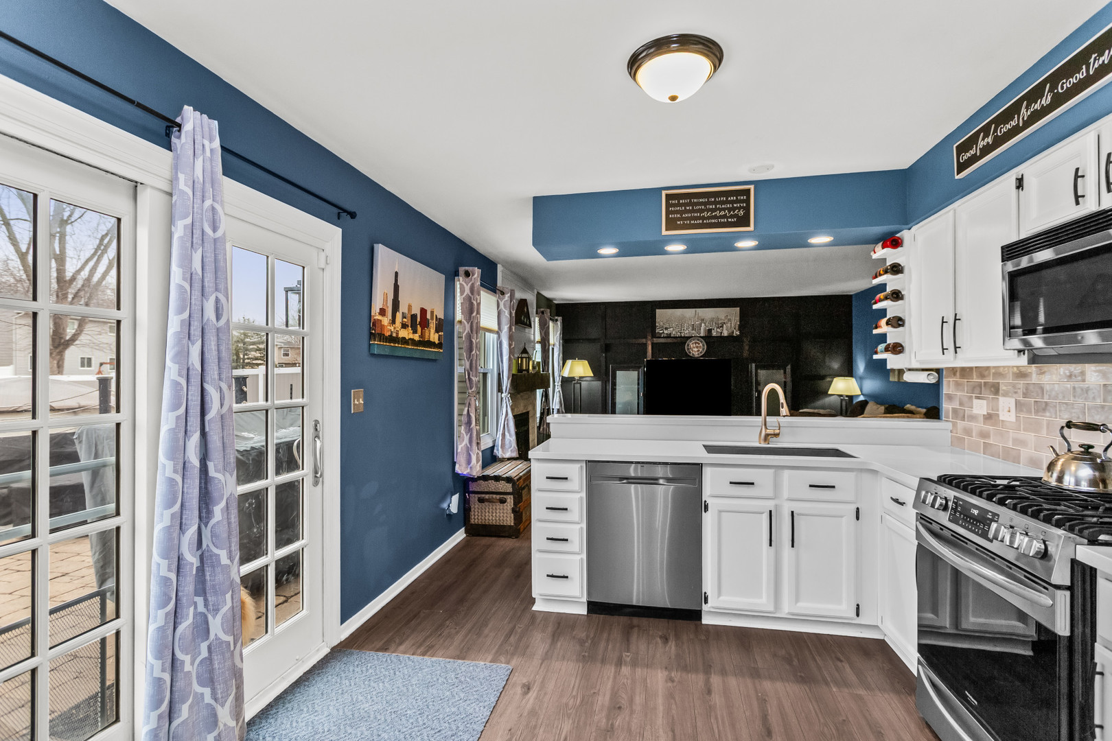 960 Mensching Road Roselle, IL 60172 - Photo 8 of 25 a kitchen with stainless steel appliances granite countertop a stove and a refrigerator
