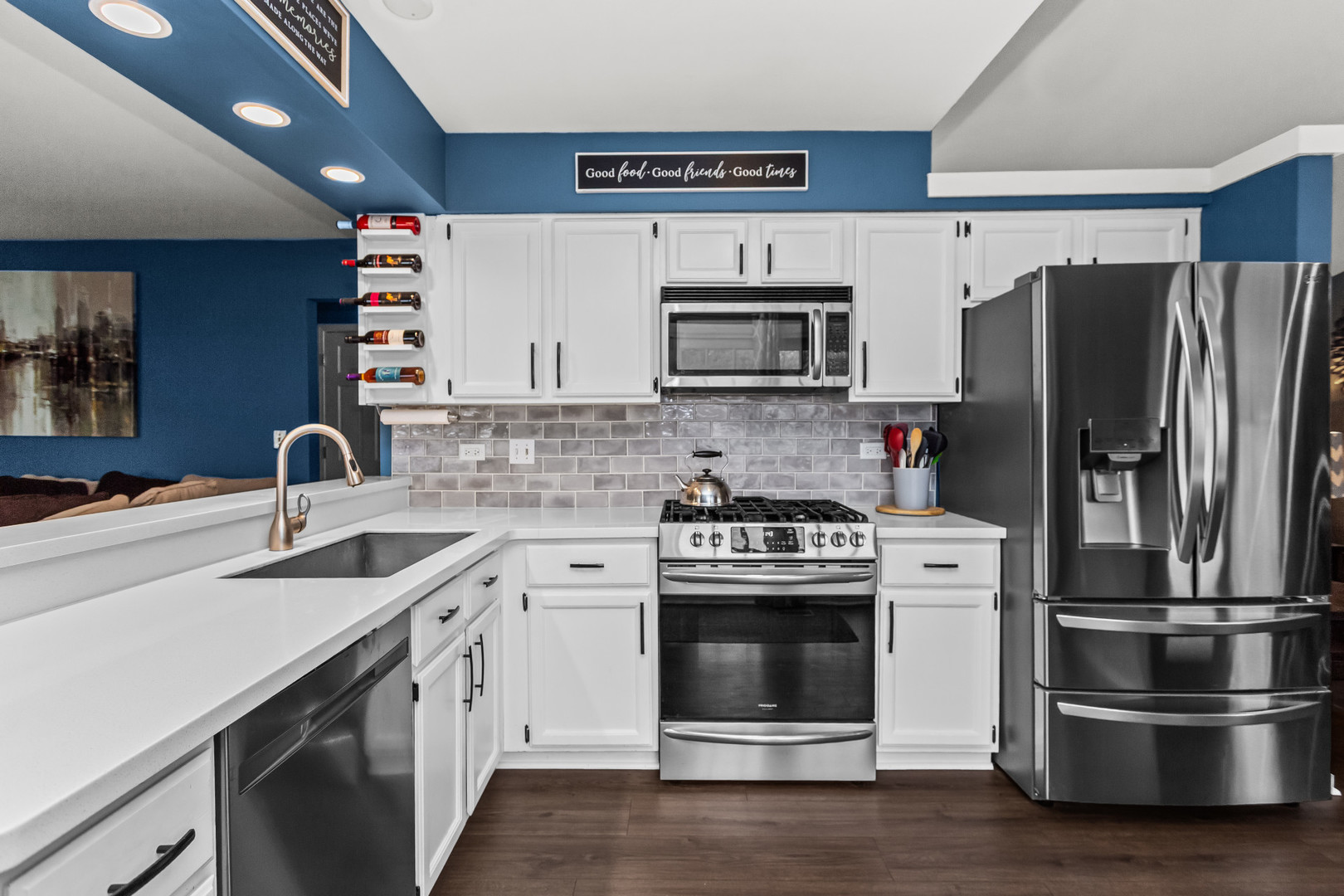 960 Mensching Road Roselle, IL 60172 - Photo 10 of 25 a kitchen with stainless steel appliances a sink cabinets and a refrigerator