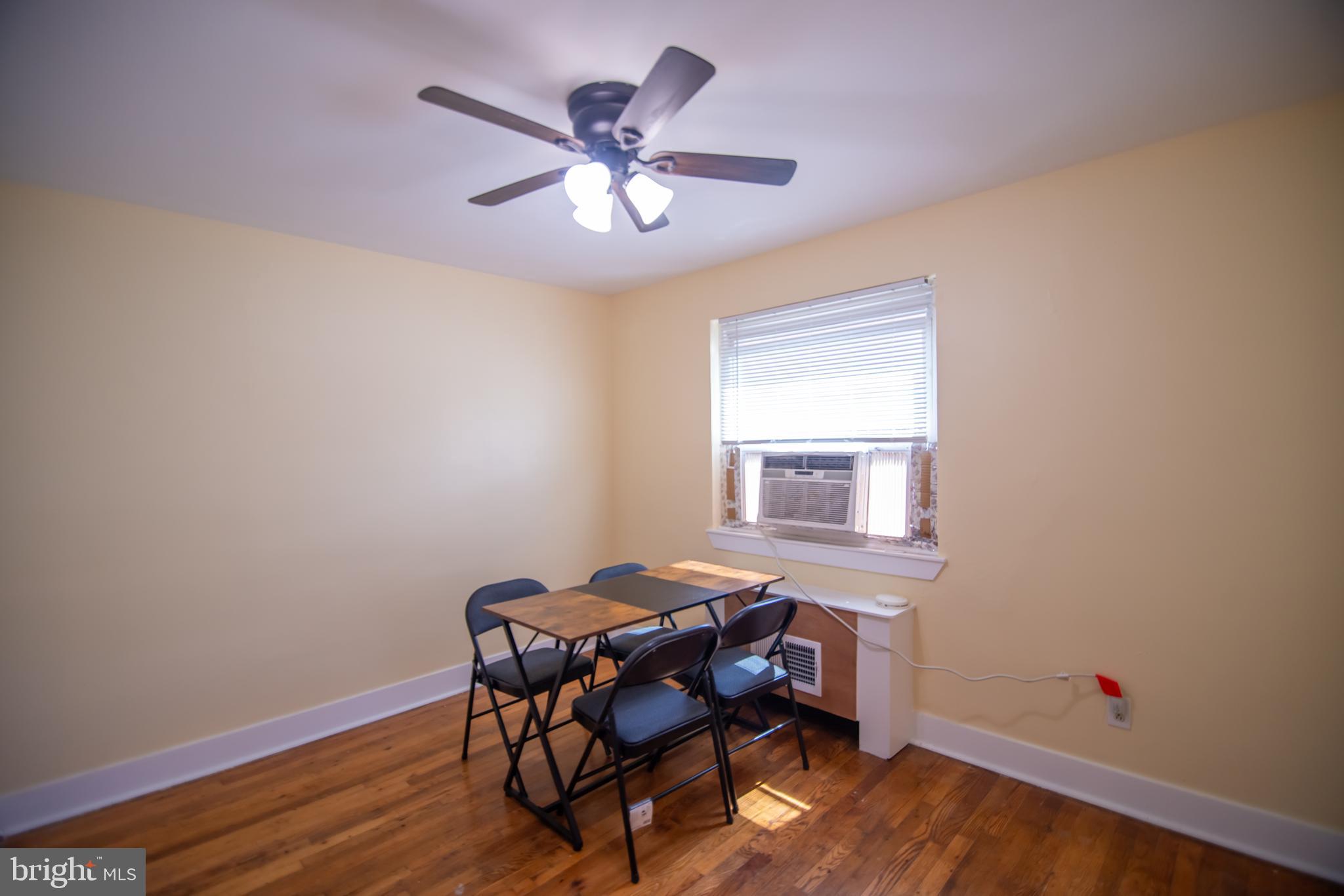 8608 Chestnut Oak Road Parkville, MD 21234 - Photo 5 of 20 a workspace with chandelier