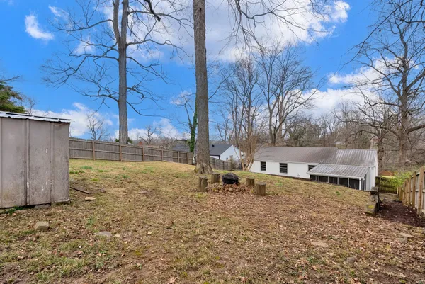 a house with trees in front of it