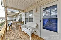 238 Hoskins Mill Lane, Unit D Charlotte, NC 28208 - Photo 12 of 13 a living room with furniture