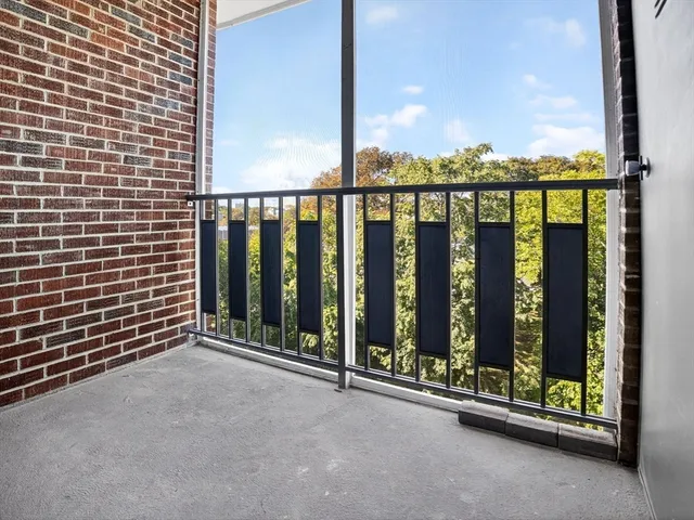 a view of a balcony with city view