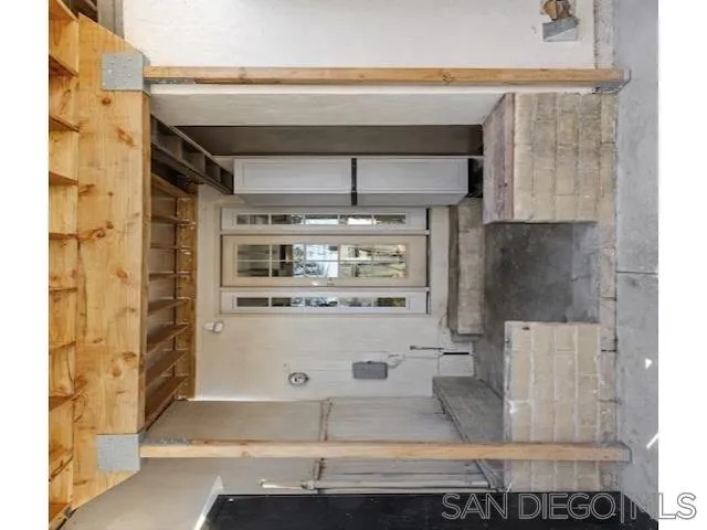 2127 Berry Street Lemon Grove, CA 91945 - Photo 24 of 25 a bathroom with a sink and a mirror