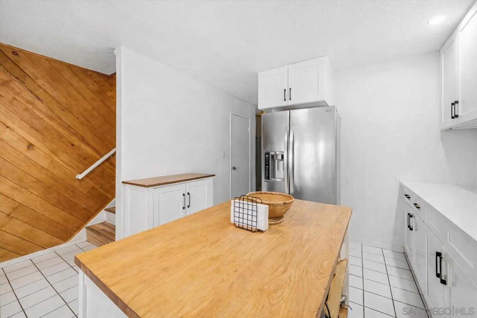 2127 Berry Street Lemon Grove, CA 91945 - Photo 4 of 25 a bathroom with a sink and a mirror