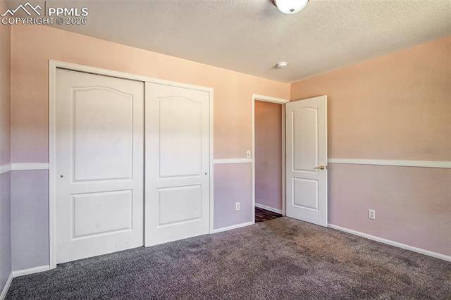 3579 Indigo Ridge Point Colorado Springs, CO 80910 - Photo 16 of 33 Bedroom 2