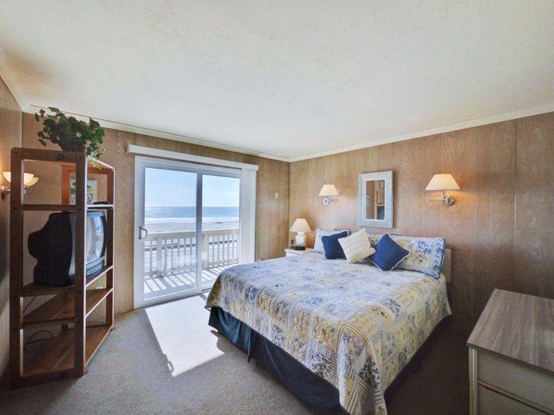 309 Beach Drive Aptos, CA 95003 - Photo 11 of 14 a bedroom with a bed and a window