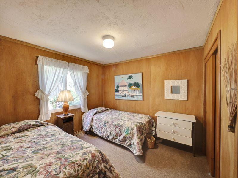 309 Beach Drive Aptos, CA 95003 - Photo 14 of 14 a bedroom with two beds and a window